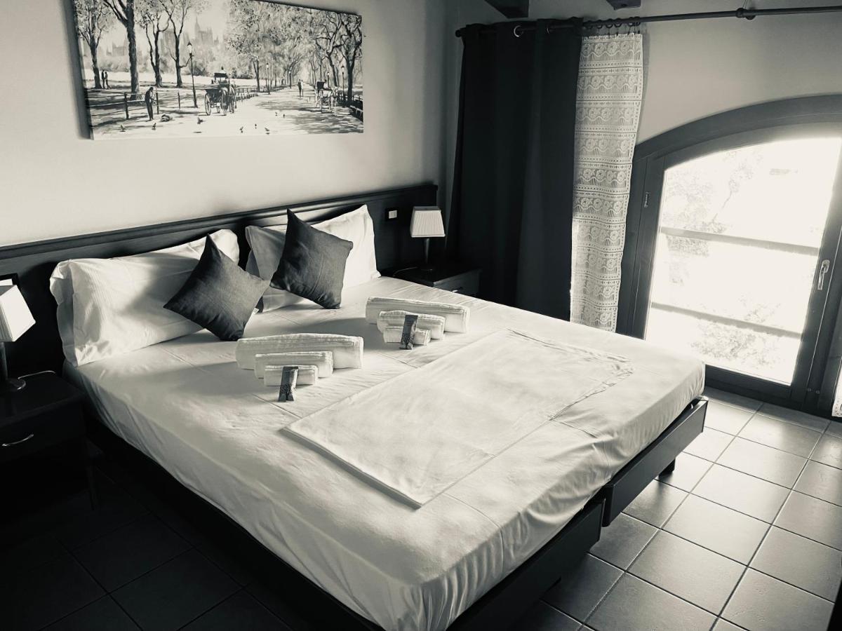 Hotel Al Bosco Sona Bagian luar foto