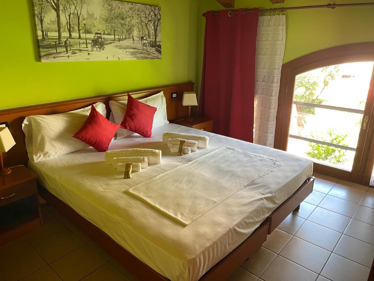 Hotel Al Bosco Sona Bagian luar foto