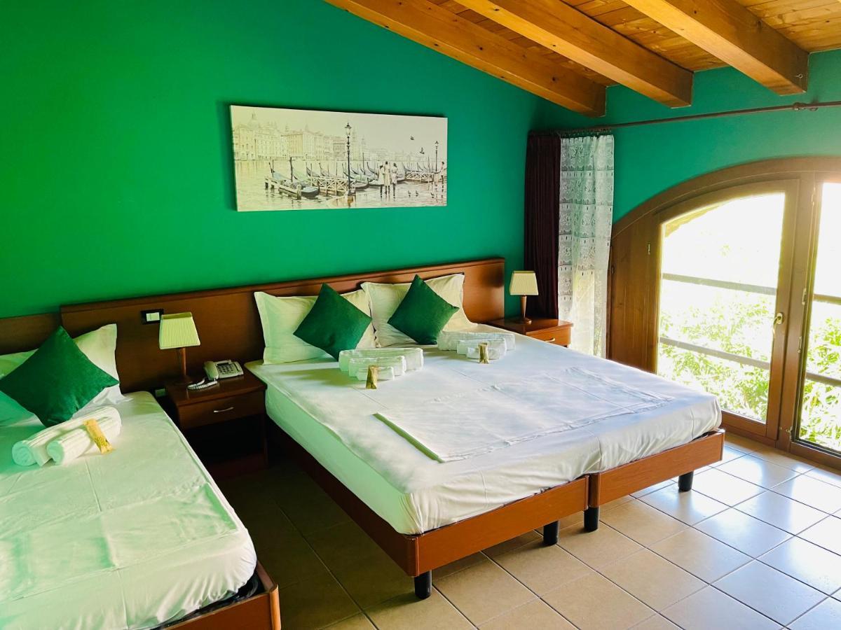 Hotel Al Bosco Sona Bagian luar foto