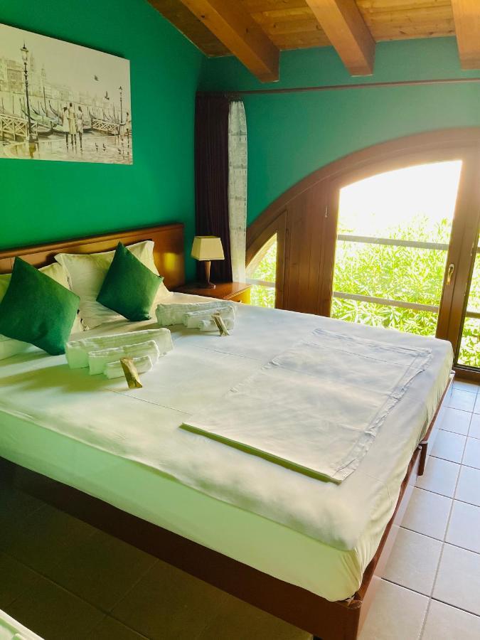 Hotel Al Bosco Sona Bagian luar foto