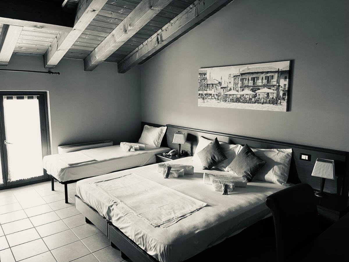 Hotel Al Bosco Sona Bagian luar foto